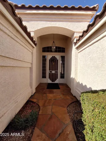 a view of an entryway with a garden