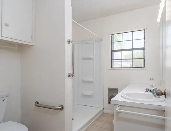 a bathroom with a sink and a toilet