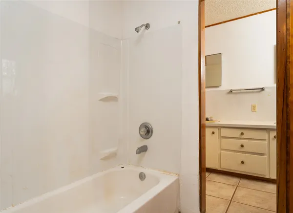 a bathroom with a bathtub