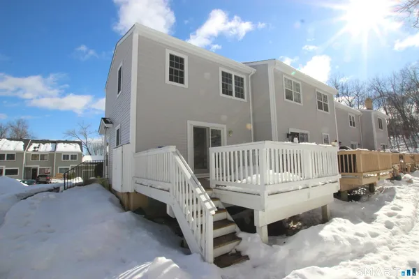 a view of a patio with a yard