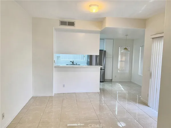 a view of a kitchen with a sink