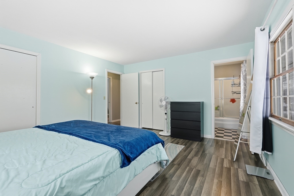 32 Homestead Avenue Greenfield, MA 01301 - Photo 16 of 41 a bedroom with a bed and a dresser