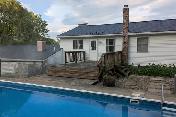 a view of a yard with an outdoor space