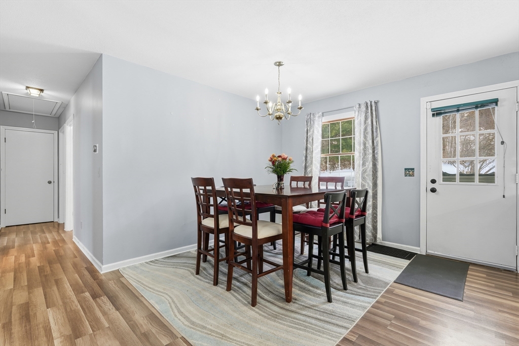 32 Homestead Avenue Greenfield, MA 01301 - Photo 9 of 41 a view of a dining room with furniture and wooden floor