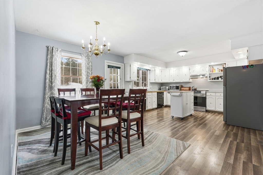 32 Homestead Avenue Greenfield, MA 01301 - Photo 10 of 41 a view of a dining room with furniture and wooden floor