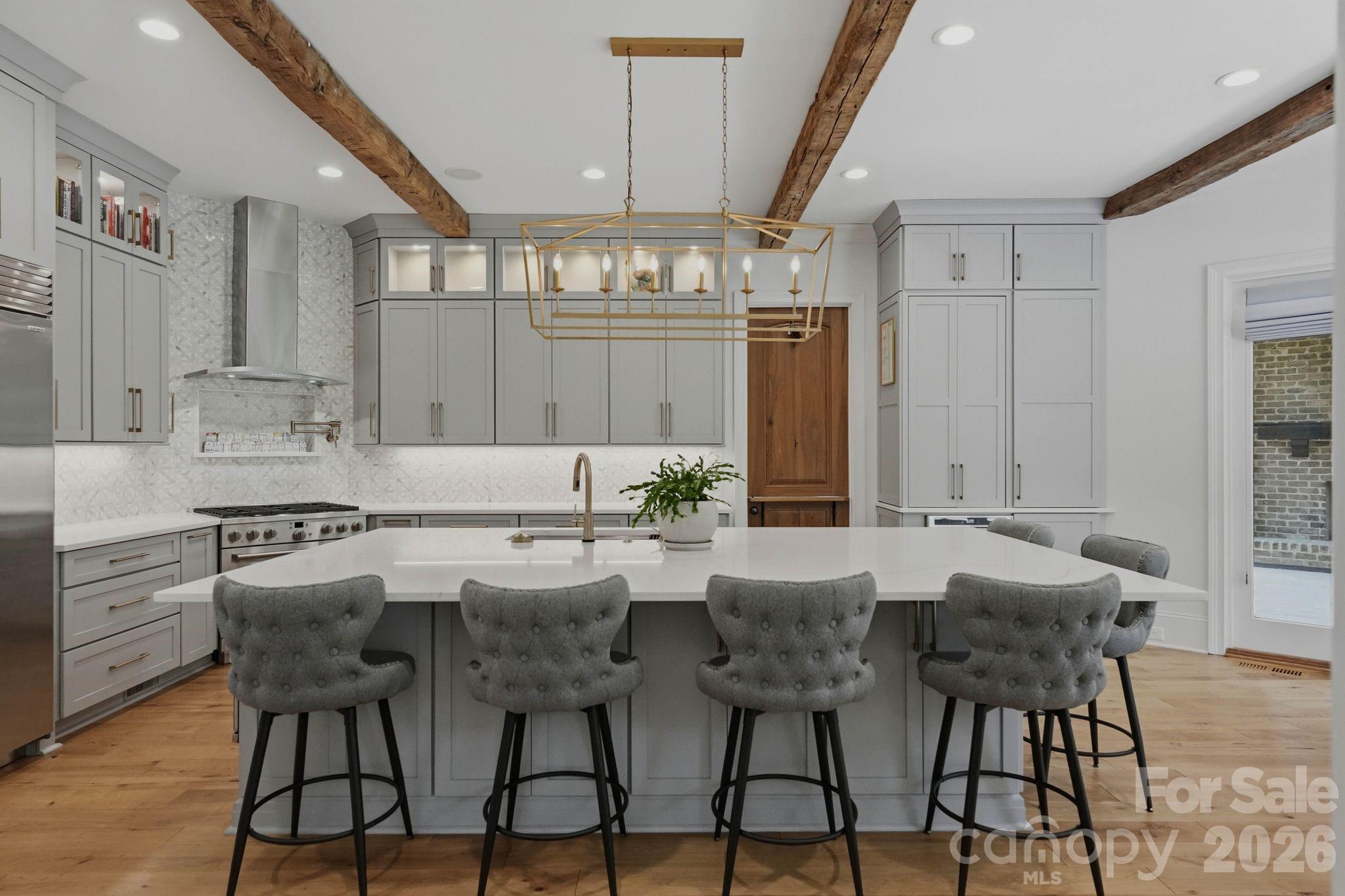 7416 Lee Rea Road Charlotte, NC 28226 - Photo 25 of 48 a view of a dining room with furniture and chandelier