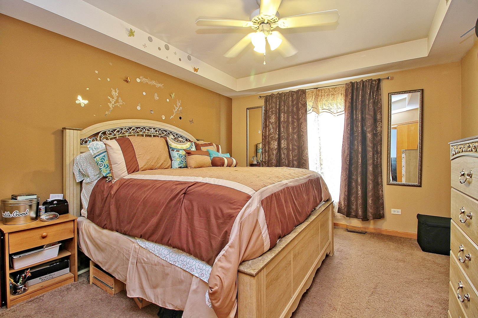 1906 Tallgrass Turn Kankakee, IL 60901 - Photo 13 of 23 a spacious bedroom with a bed and a chandelier