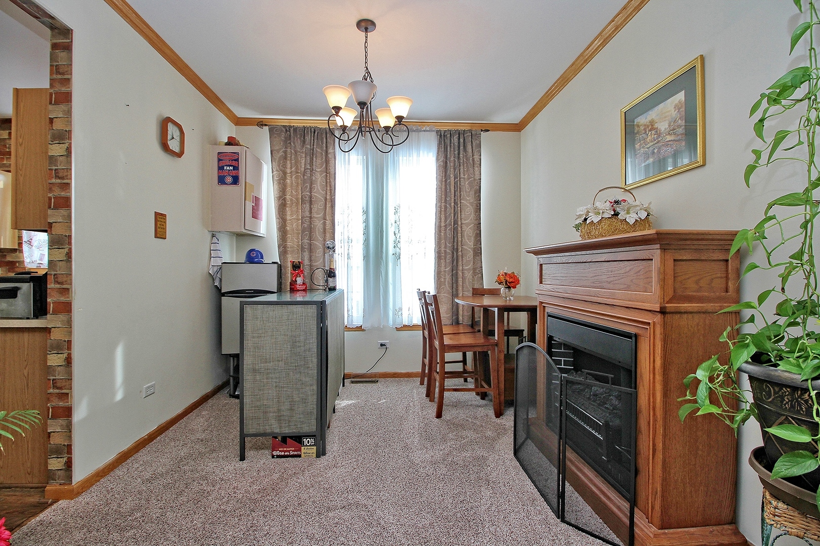 1906 Tallgrass Turn Kankakee, IL 60901 - Photo 5 of 23 a view of a livingroom with furniture and a chandelier