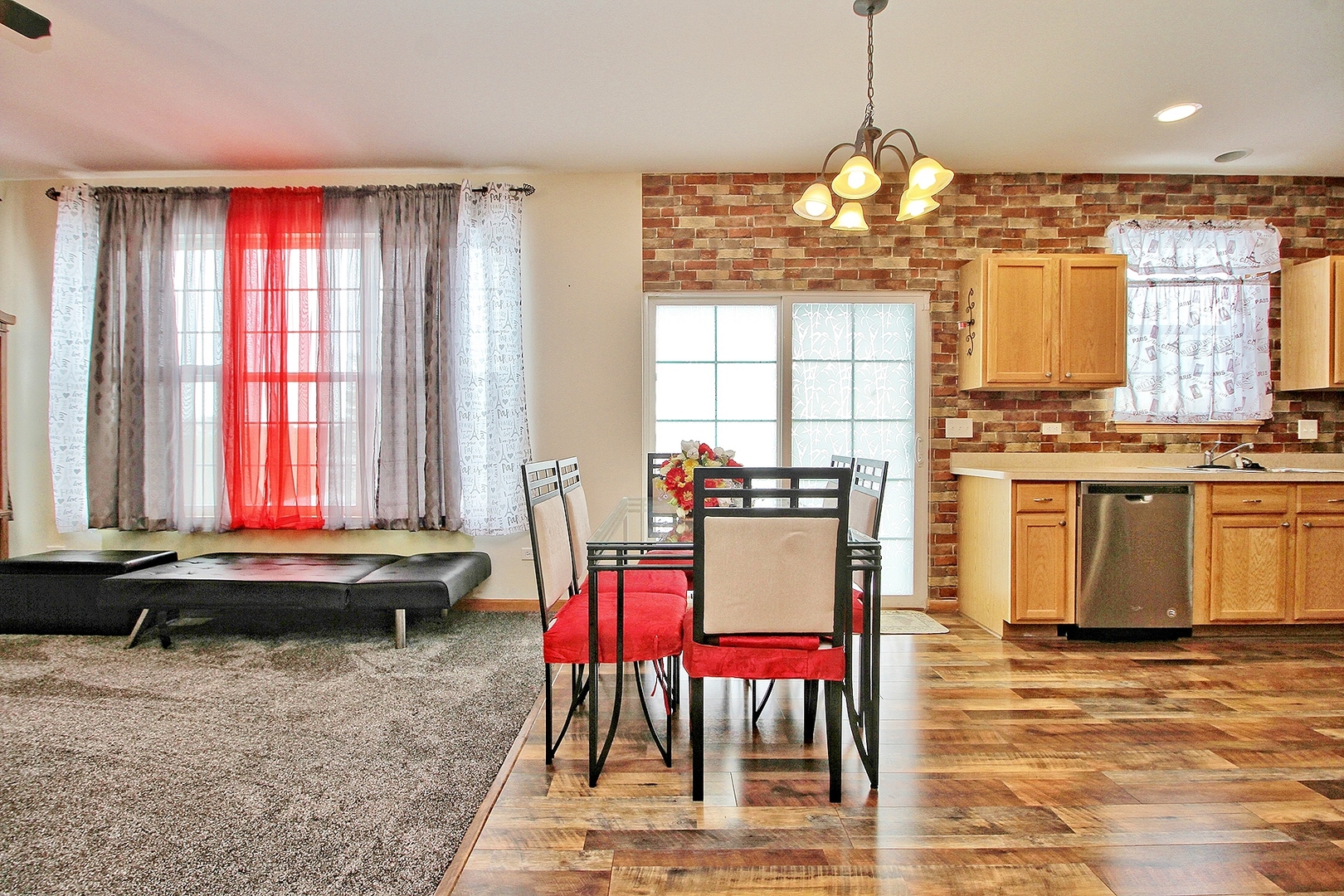 1906 Tallgrass Turn Kankakee, IL 60901 - Photo 8 of 23 a view of a dining room with furniture and window