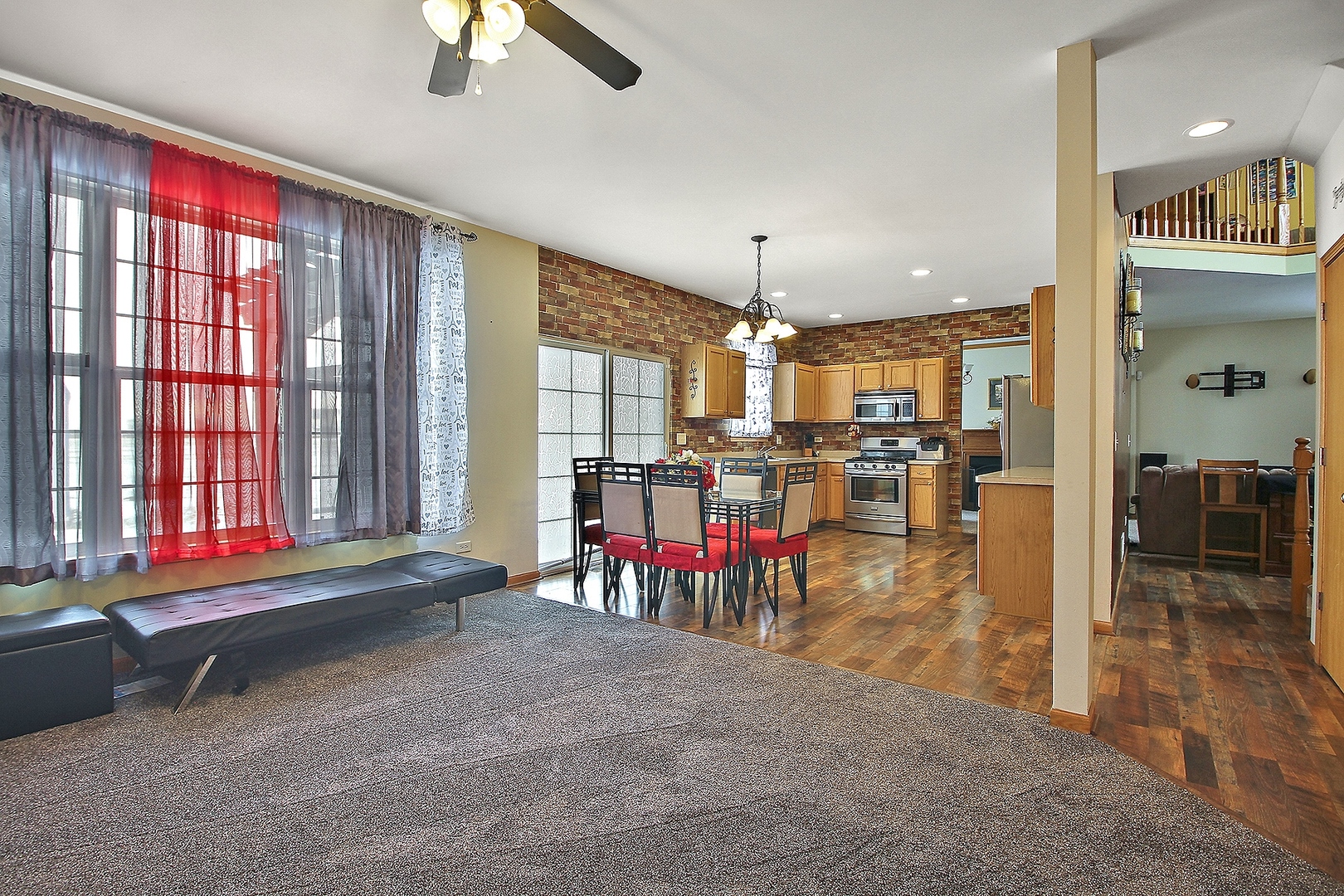1906 Tallgrass Turn Kankakee, IL 60901 - Photo 9 of 23 a living room with furniture and a large window