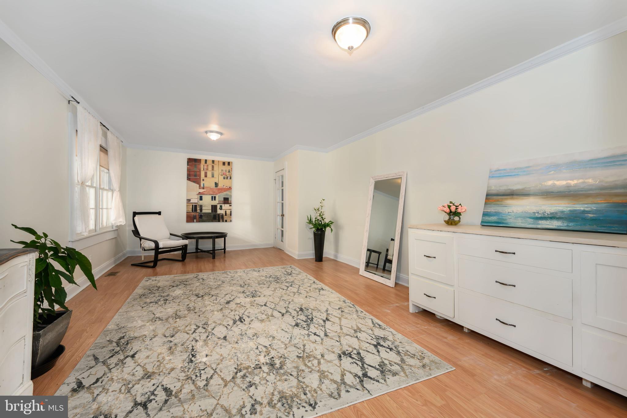 2669 Ocean Gateway Trappe, MD 21673 - Photo 23 of 47 a living room with furniture and a dresser