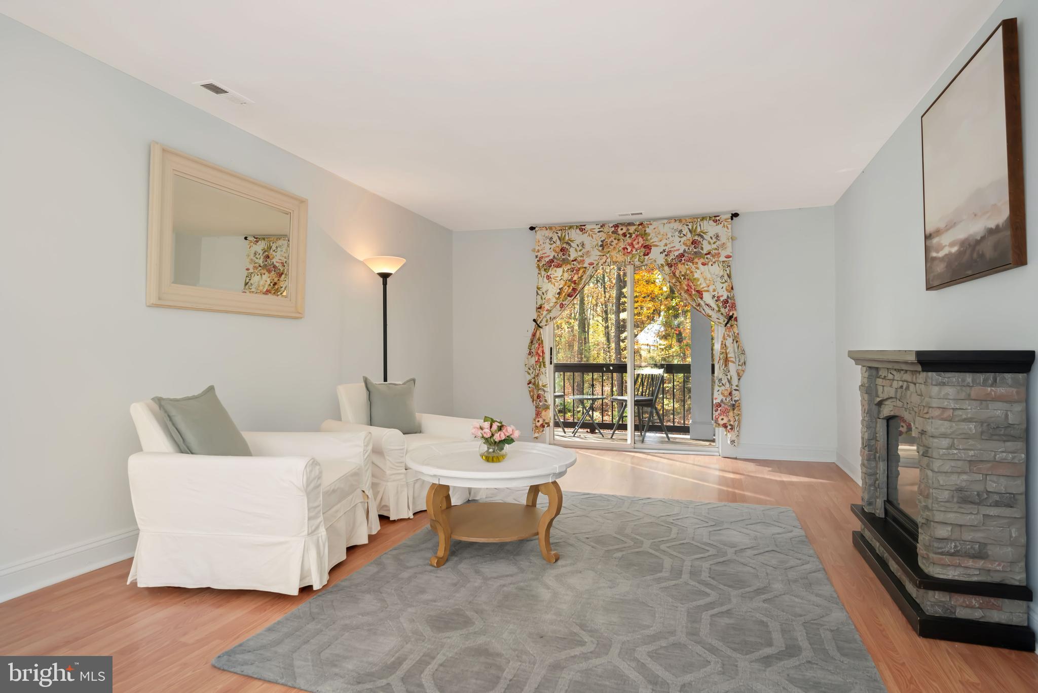 2669 Ocean Gateway Trappe, MD 21673 - Photo 28 of 47 a living room with furniture and a fireplace