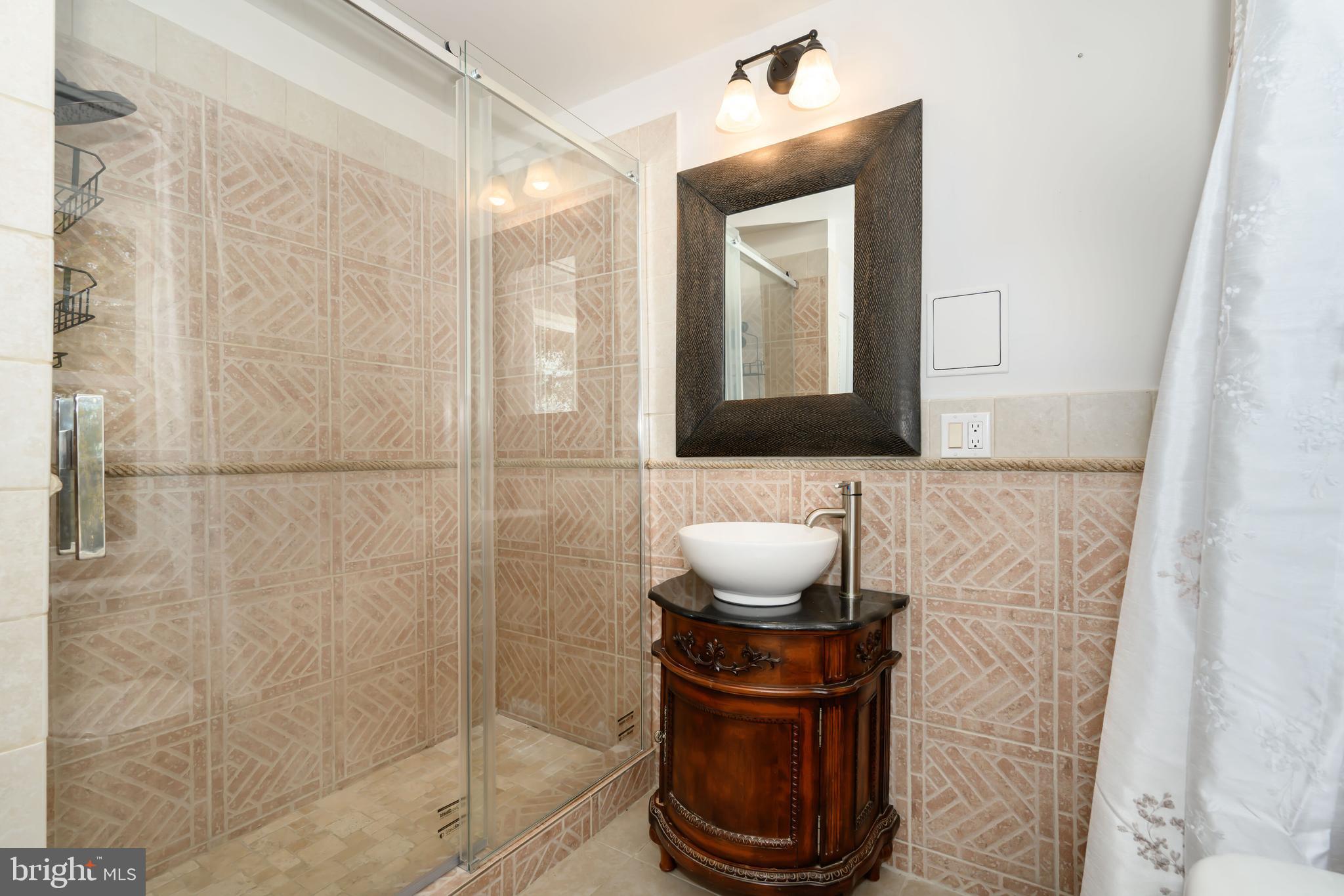 2669 Ocean Gateway Trappe, MD 21673 - Photo 33 of 47 a bathroom with a toilet and a mirror