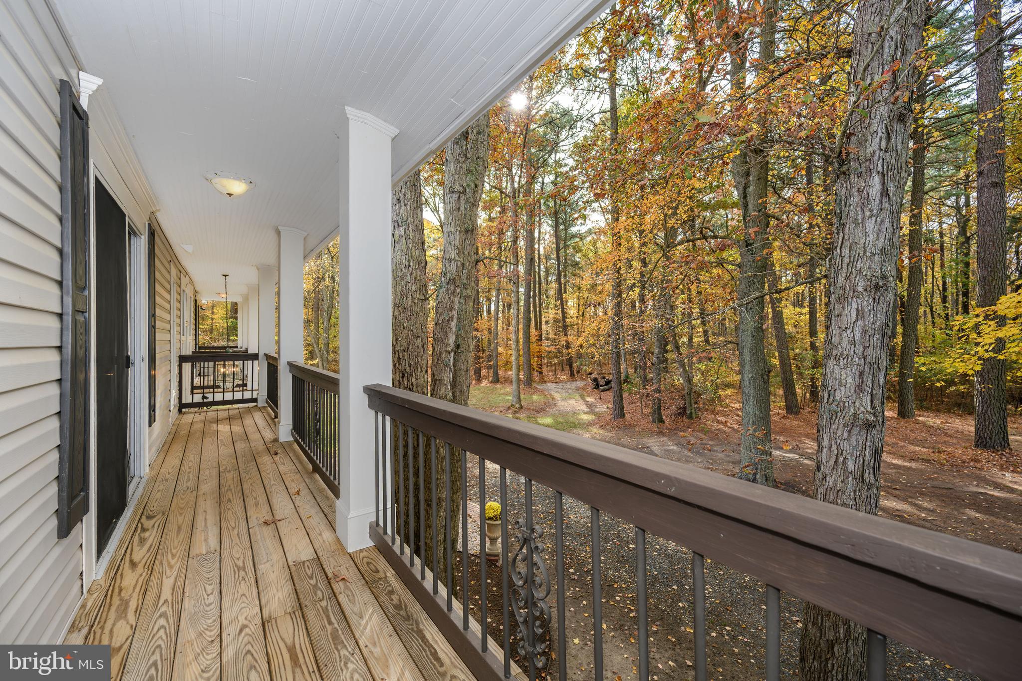 2669 Ocean Gateway Trappe, MD 21673 - Photo 39 of 47 a view of a balcony with wooden floor