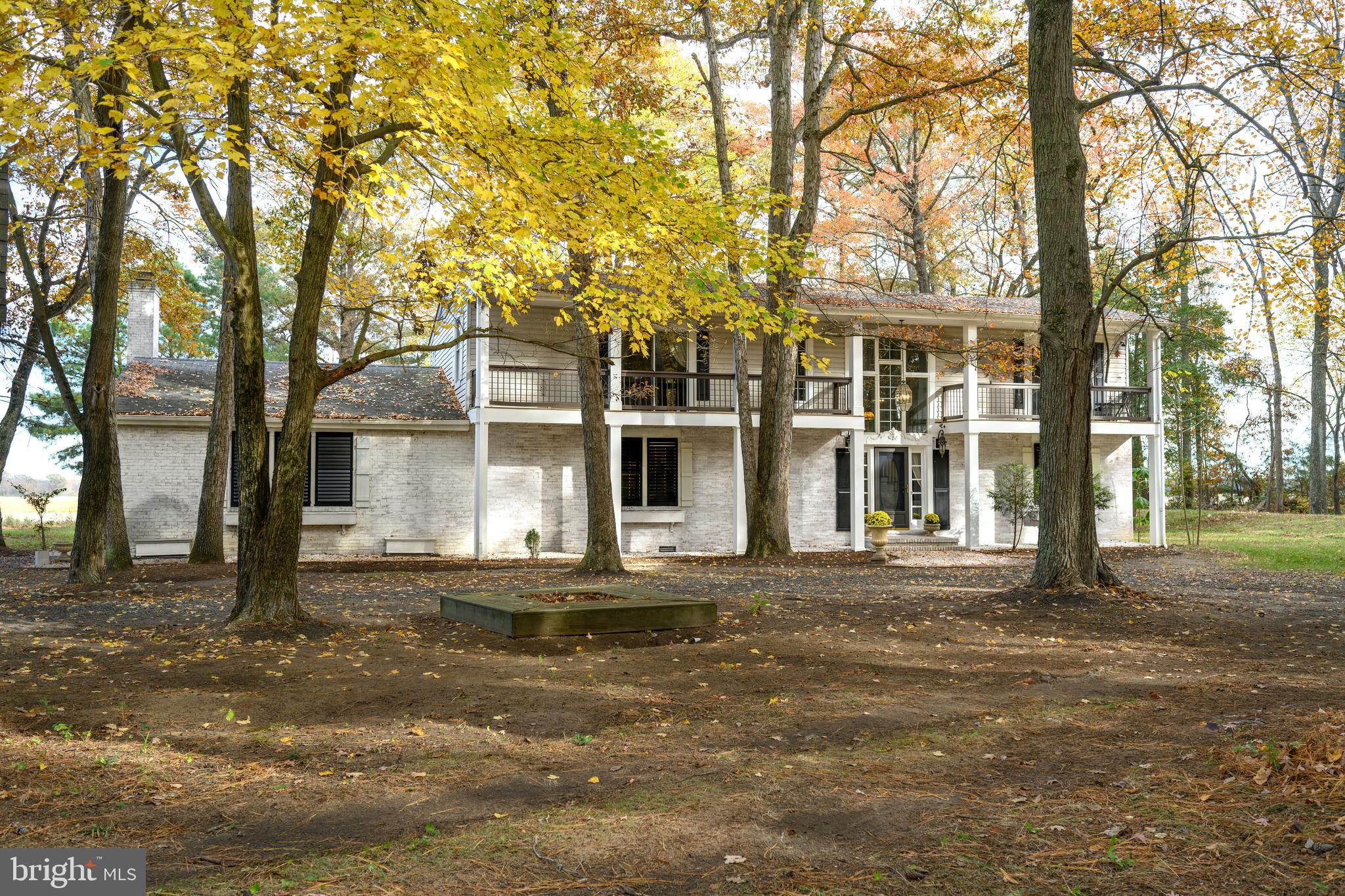2669 Ocean Gateway Trappe, MD 21673 - Photo 8 of 47 a front view of a house with a garden