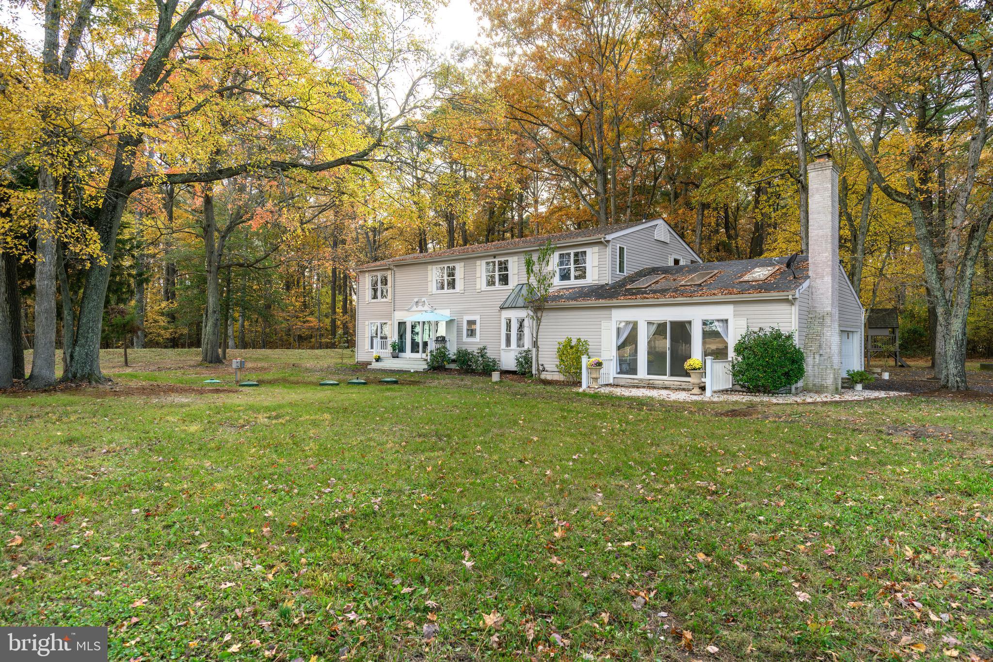 2669 Ocean Gateway Trappe, MD 21673 - Photo 10 of 47 a front view of a house with garden