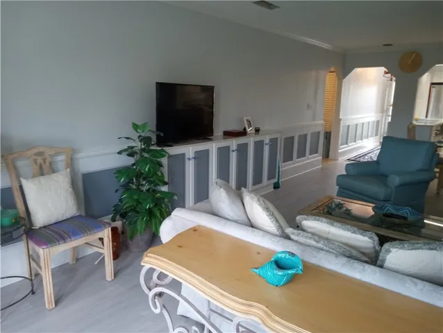 a bedroom with a bed and a lamp