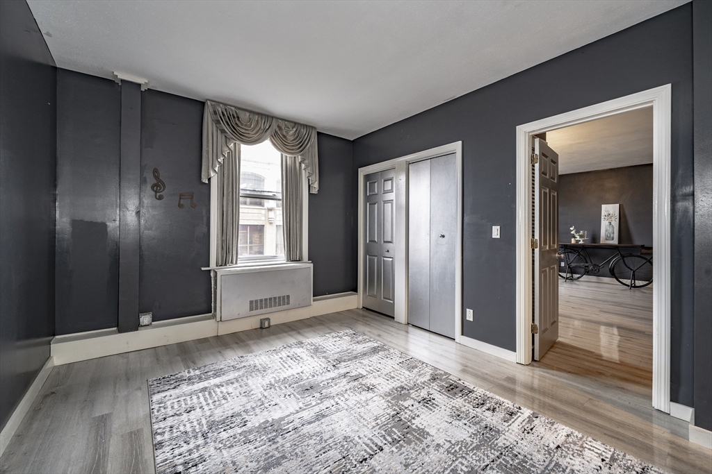 140 Chestnut Street, Unit 310 Springfield, MA 01103 - Photo 12 of 25 wooden floor and windows in a room