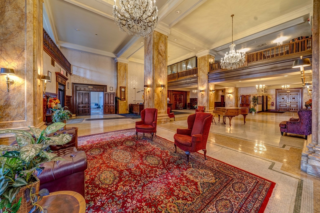 140 Chestnut Street, Unit 310 Springfield, MA 01103 - Photo 18 of 25 a lobby with furniture and rug