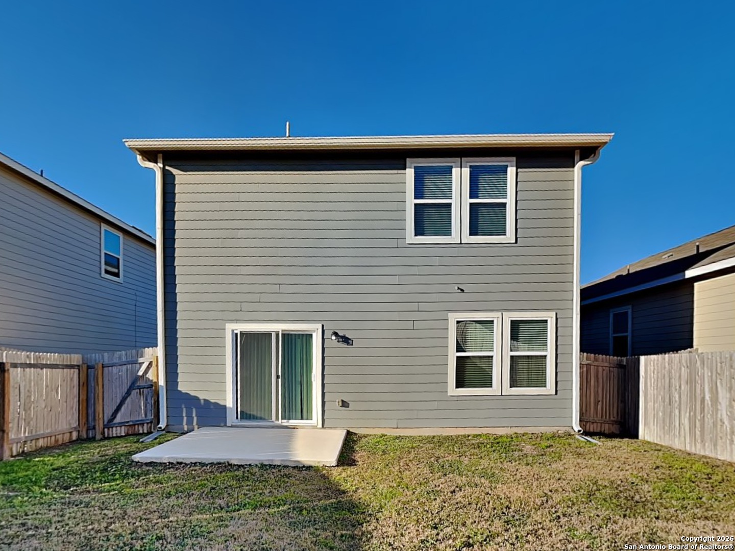 5206 Winding Street St. Hedwig, TX 78152 - Photo 15 of 17 a front view of a house with garden