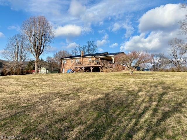 927 Shingle Gap Road Purlear, NC 28665 - Photo 15 of 33 Back of house/Back yard