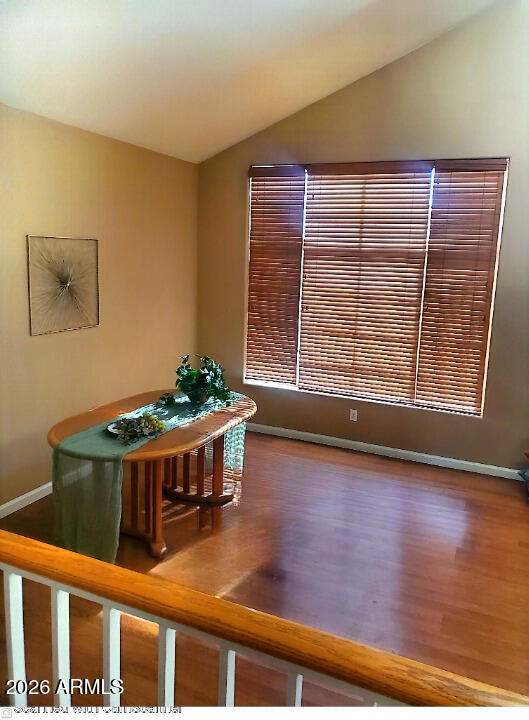 11058 East Cholla Road Mesa, AZ 85207 - Photo 10 of 22 a living room with furniture and a wooden floor