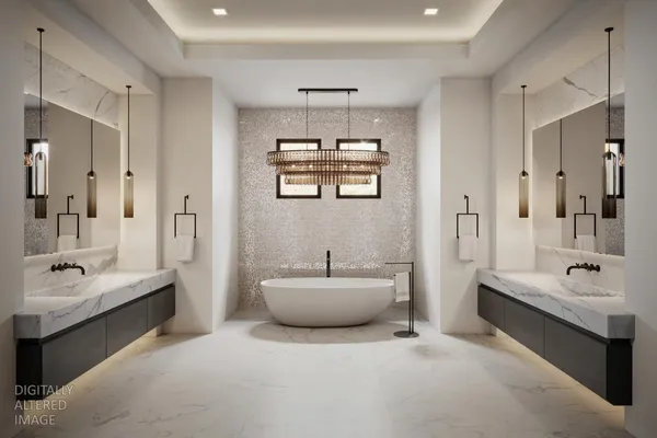 a bathroom with a tub sink and mirror