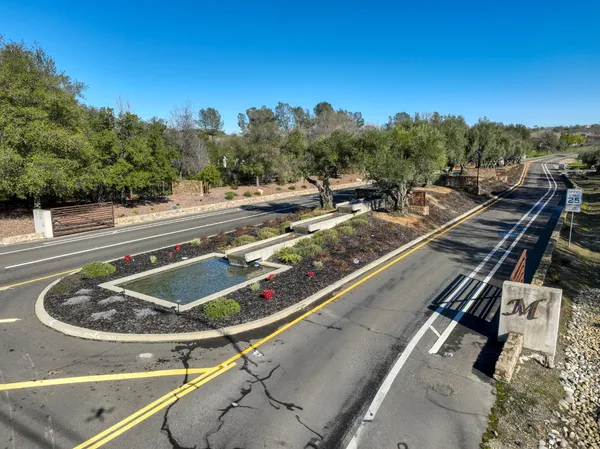 a view of a swimming pool with a balcony