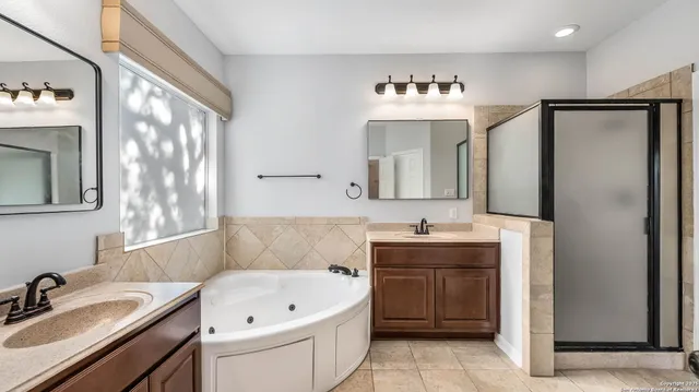 a bathroom with a sink and a bathtub