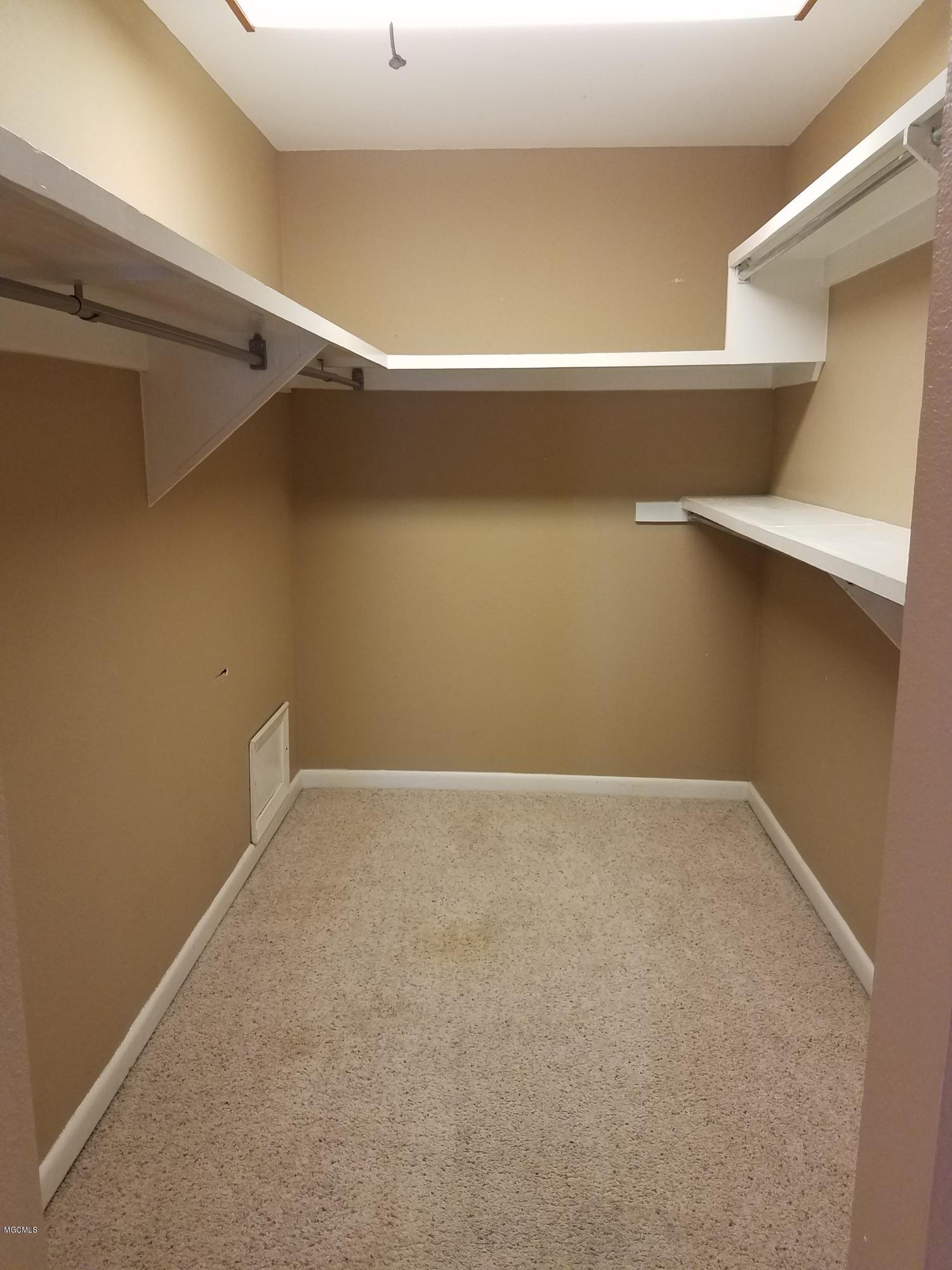 717 Bienville Boulevard, Unit B4 Ocean Springs, MS 39564 - Photo 17 of 24 MASTER CLOSET