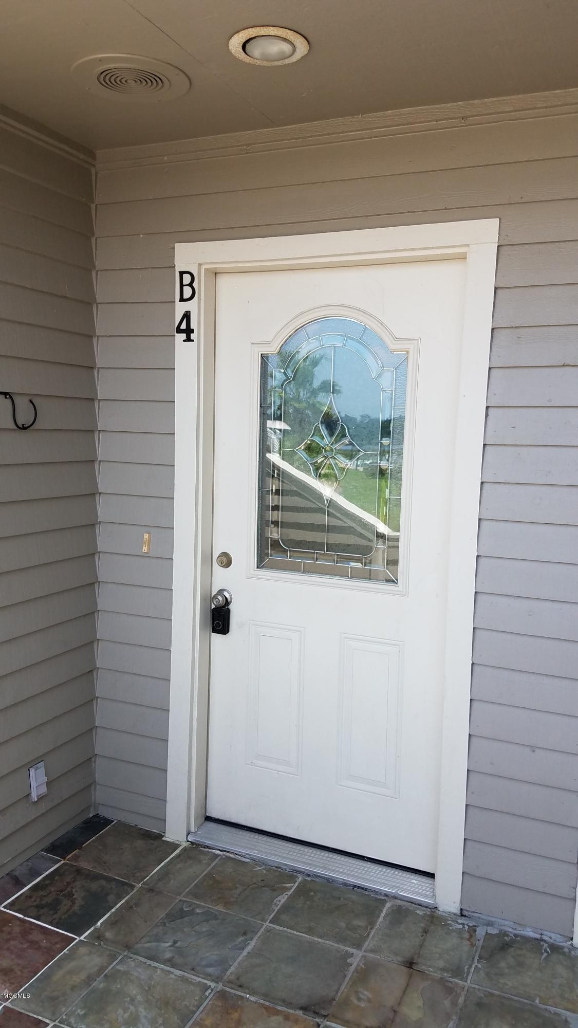 717 Bienville Boulevard, Unit B4 Ocean Springs, MS 39564 - Photo 3 of 24 FRONT