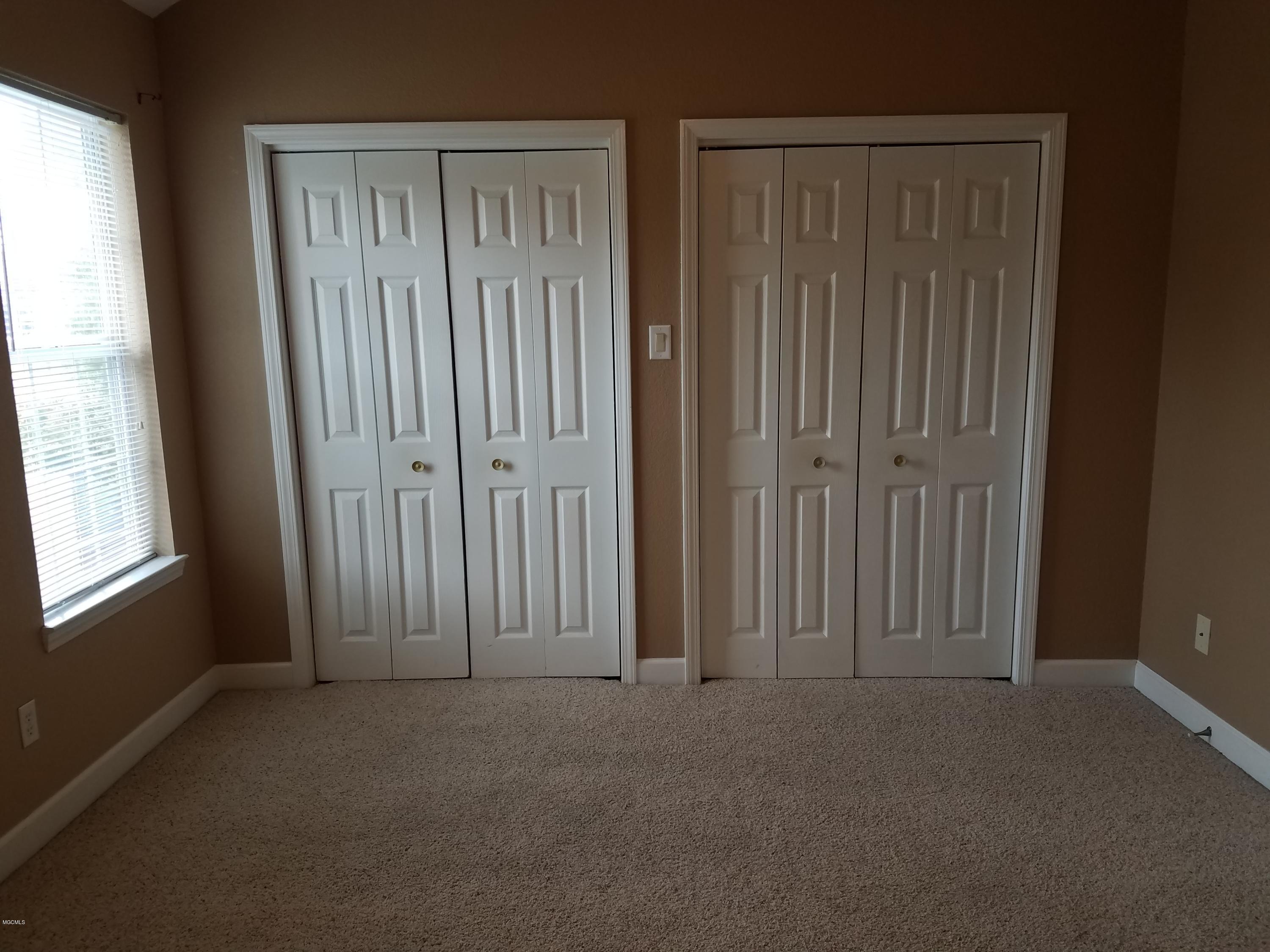 717 Bienville Boulevard, Unit B4 Ocean Springs, MS 39564 - Photo 9 of 24 FRONT BR CLOSET