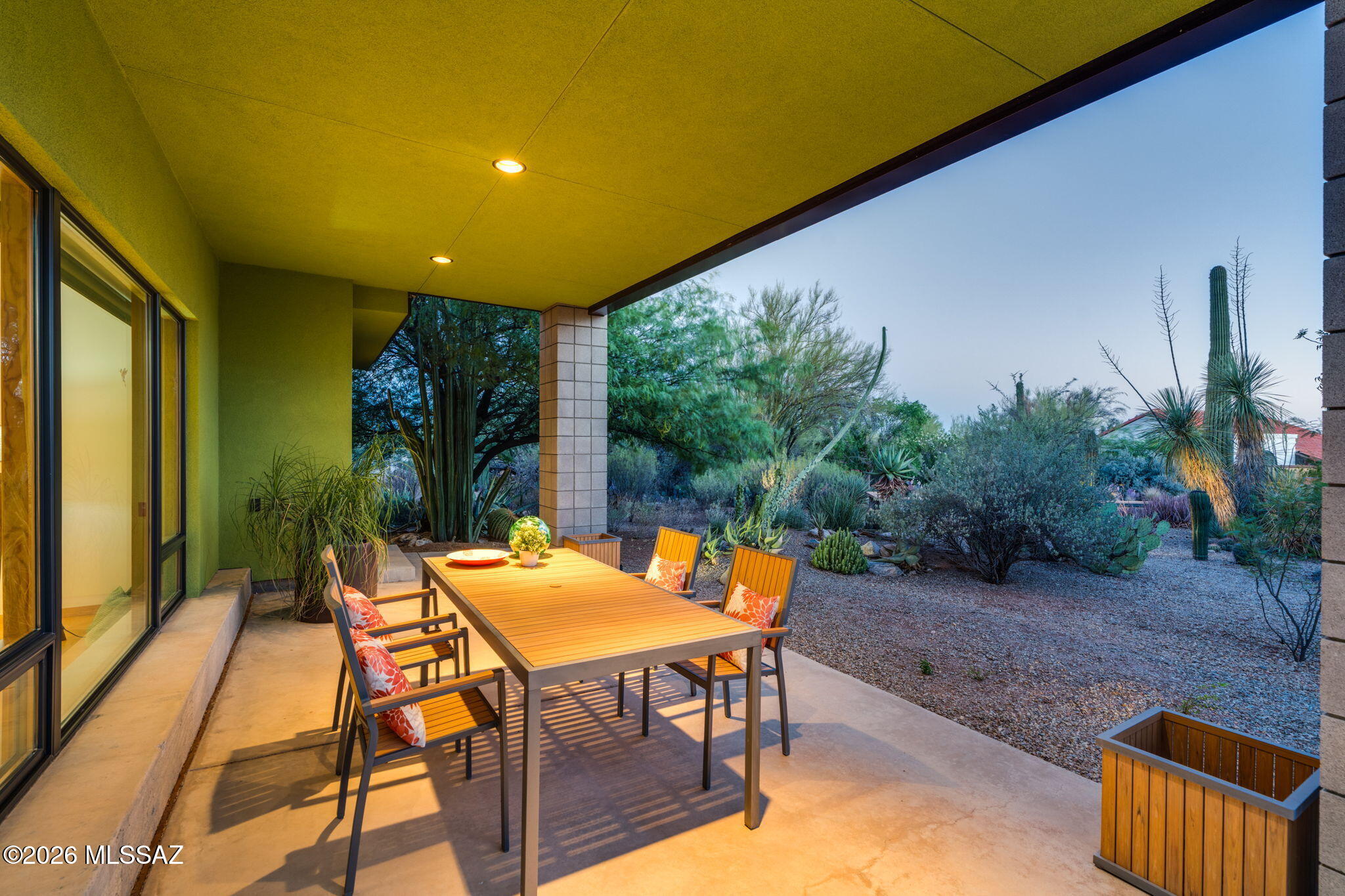 5070 North Valley View Road Tucson, AZ 85718 - Photo 42 of 51 a backyard of a house with table and chairs