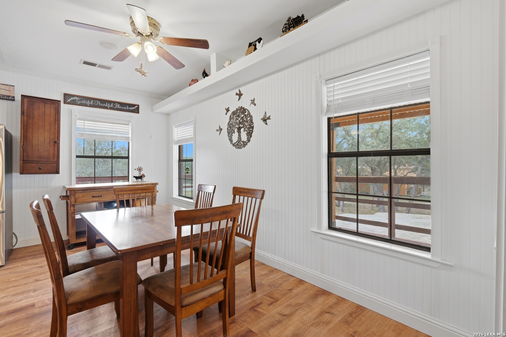 423 Las Hadas Spring Branch, TX 78070 - Photo 11 of 29 a view of a dining room with furniture window and wooden floor