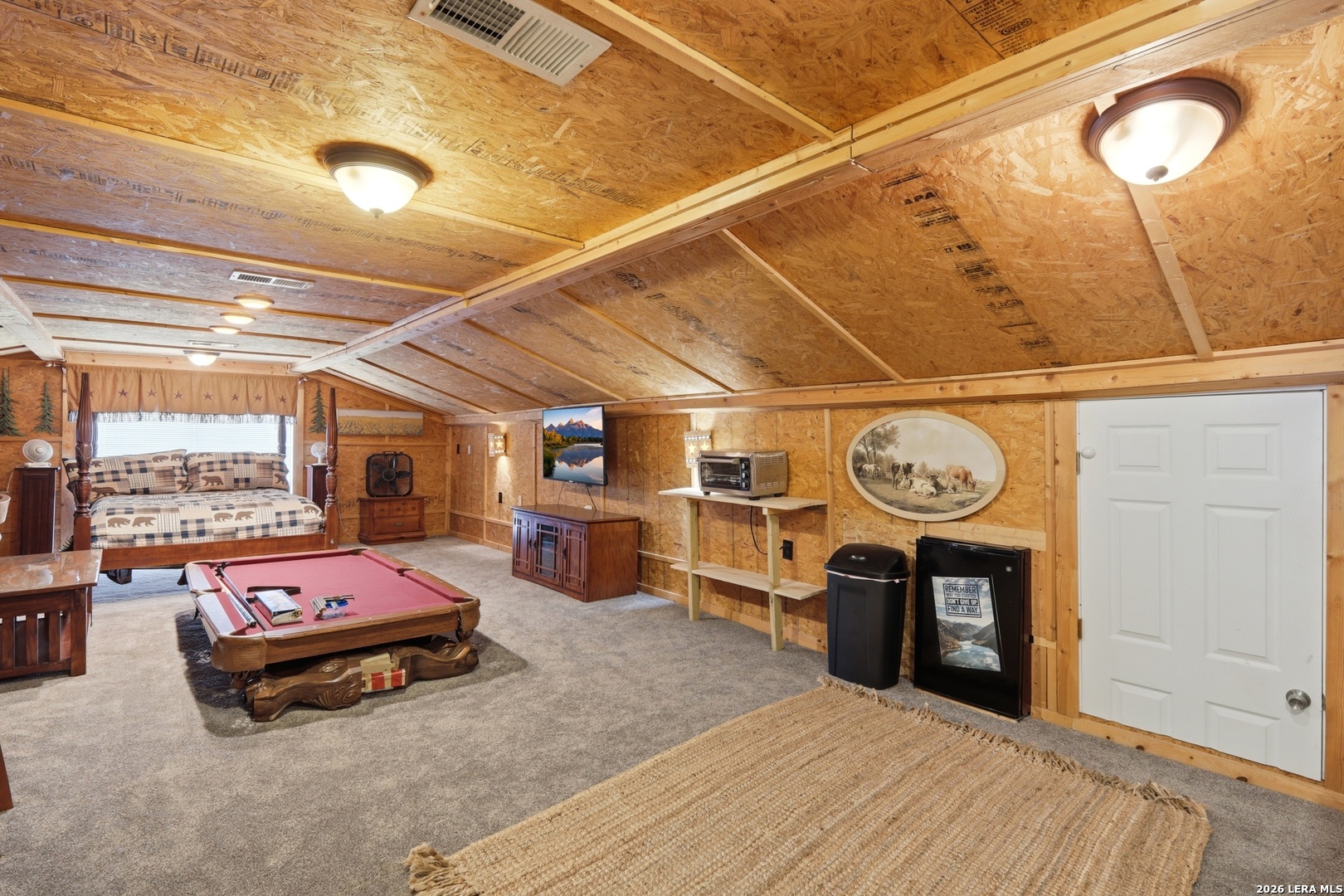 423 Las Hadas Spring Branch, TX 78070 - Photo 17 of 29 a living room with furniture and a clock