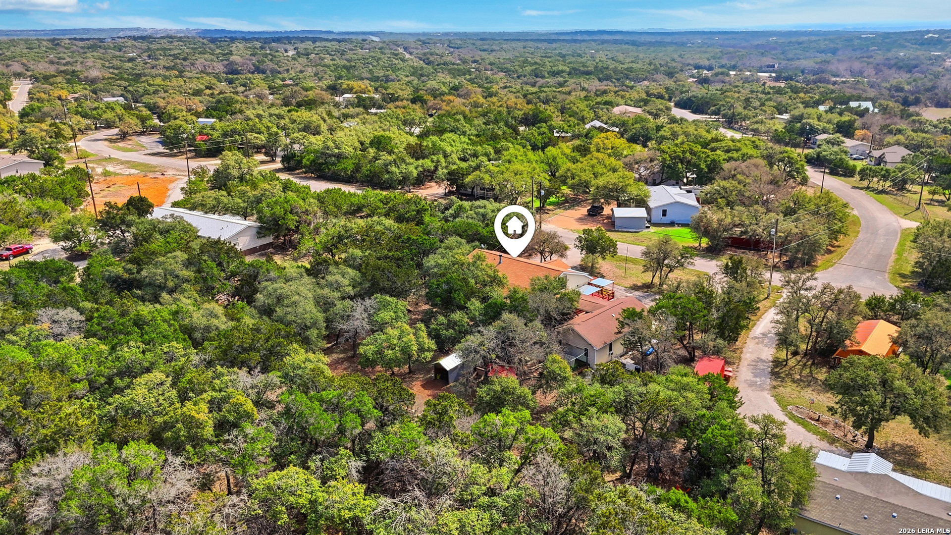 423 Las Hadas Spring Branch, TX 78070 - Photo 27 of 29 an aerial view of residential houses with outdoor space and trees