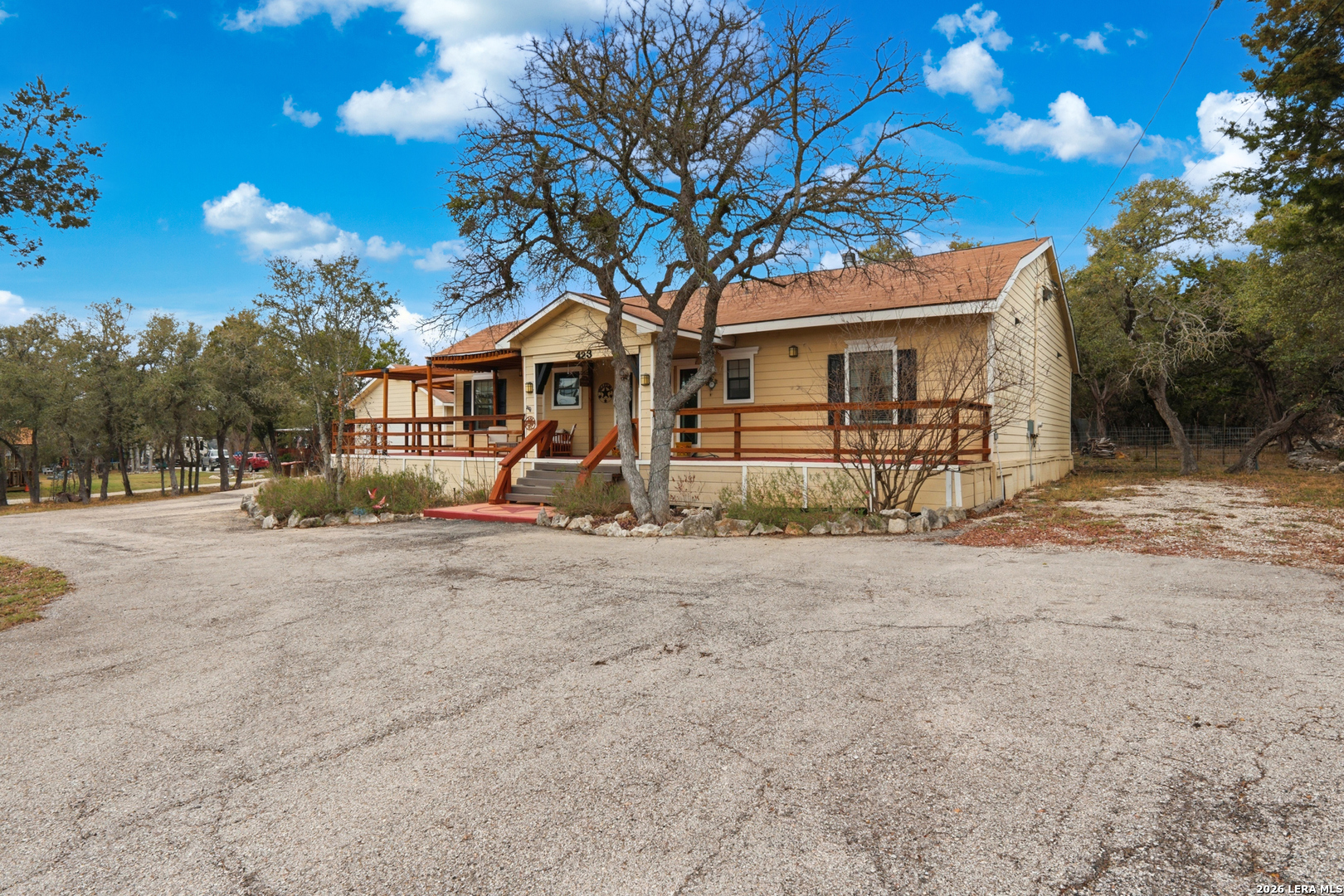423 Las Hadas Spring Branch, TX 78070 - Photo 4 of 29 a view of a house with a yard