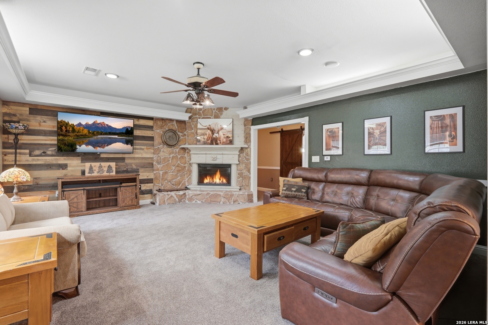 423 Las Hadas Spring Branch, TX 78070 - Photo 9 of 29 a living room with furniture and a fireplace