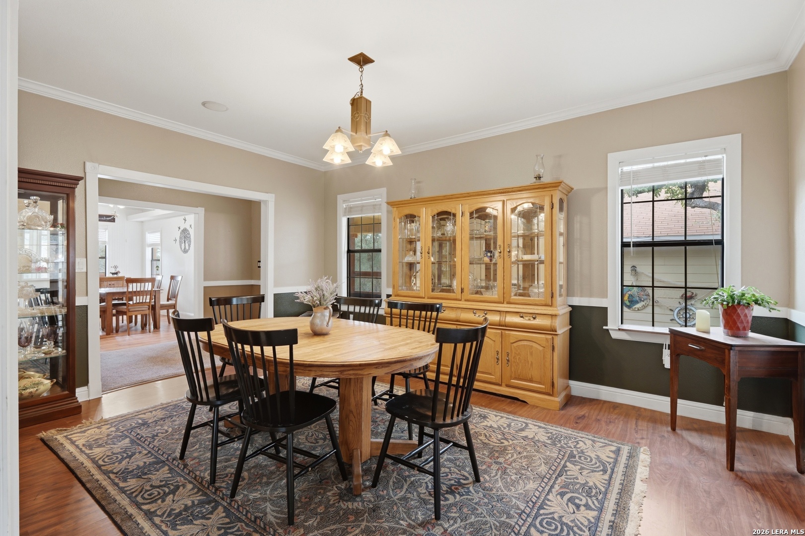 423 Las Hadas Spring Branch, TX 78070 - Photo 10 of 29 a view of a dining room with furniture window and wooden floor