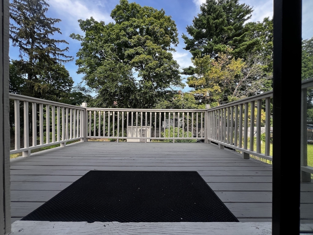 53 Thompson Street Springfield, MA 01109 - Photo 11 of 42 a view of balcony with wooden floor and fence