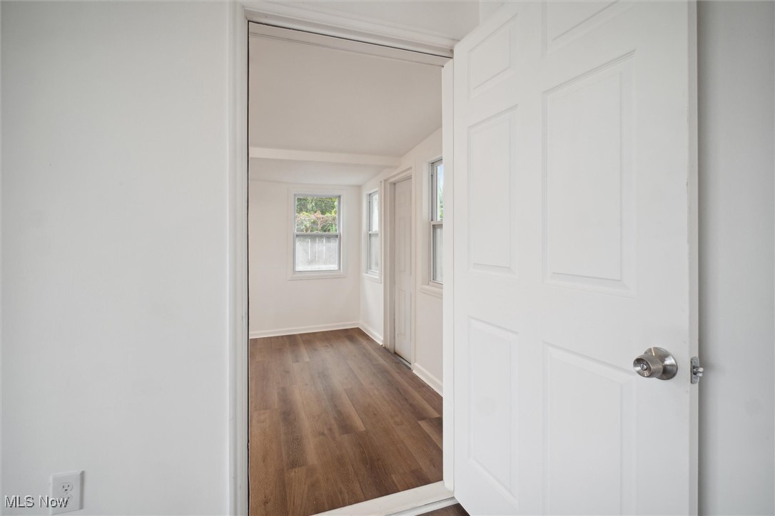8796 West Ridgewood Drive Cleveland, OH 44130 - Photo 20 of 38 Corridor featuring hardwood / wood-style floors