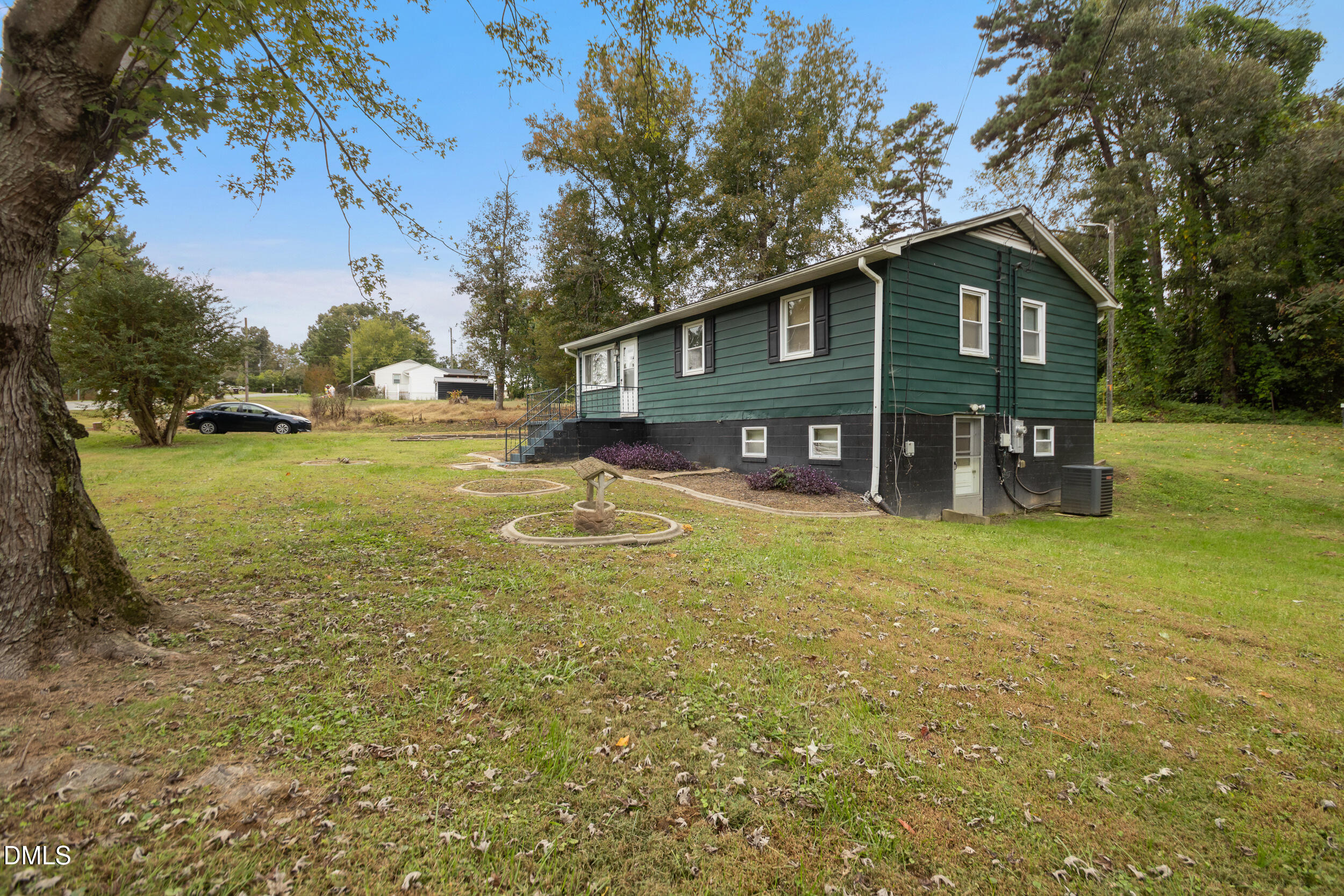 811 Jones Lester Road Roxboro, NC 27574 - Photo 24 of 27 a view of a house with a yard