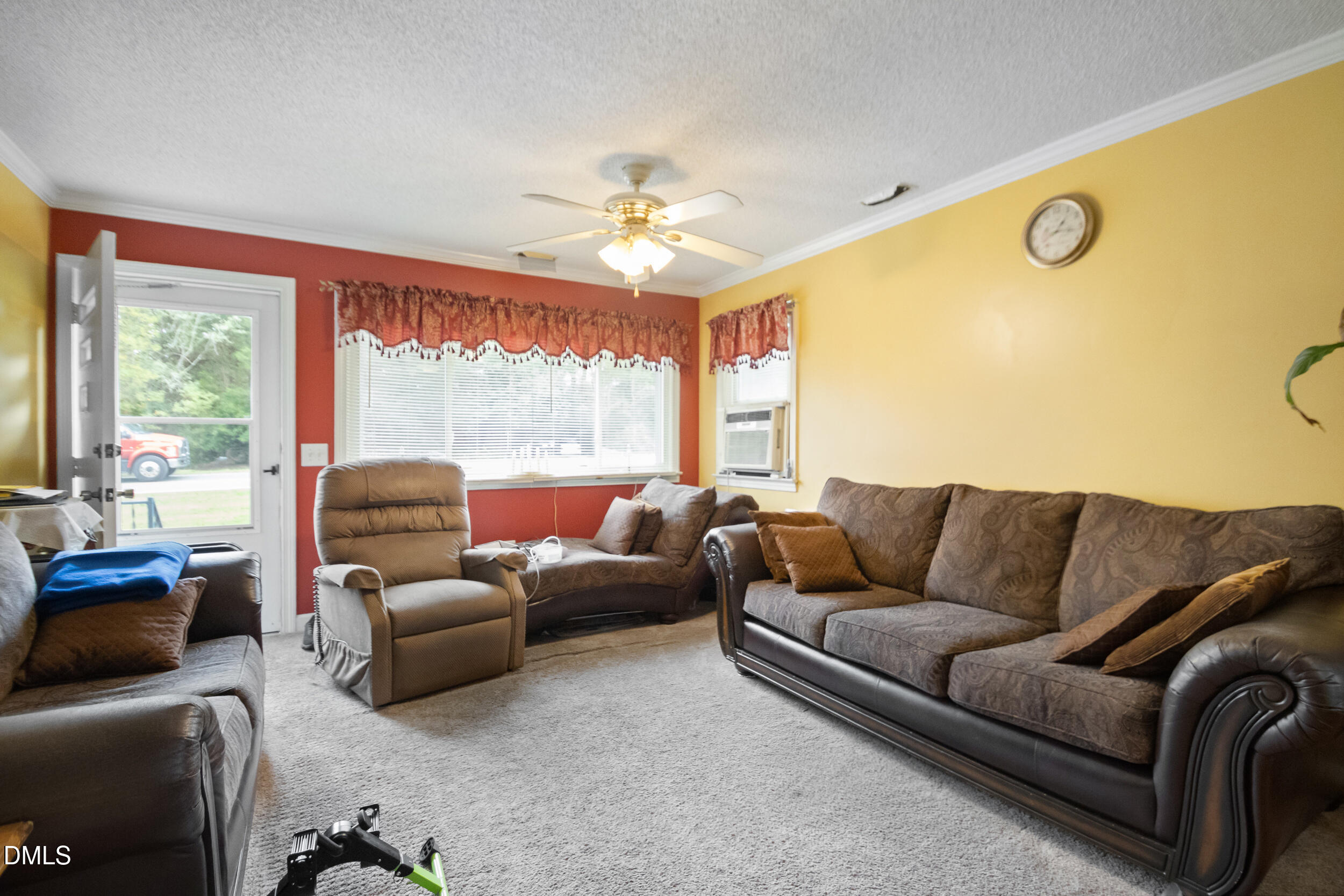 811 Jones Lester Road Roxboro, NC 27574 - Photo 2 of 27 a living room with furniture and a large window