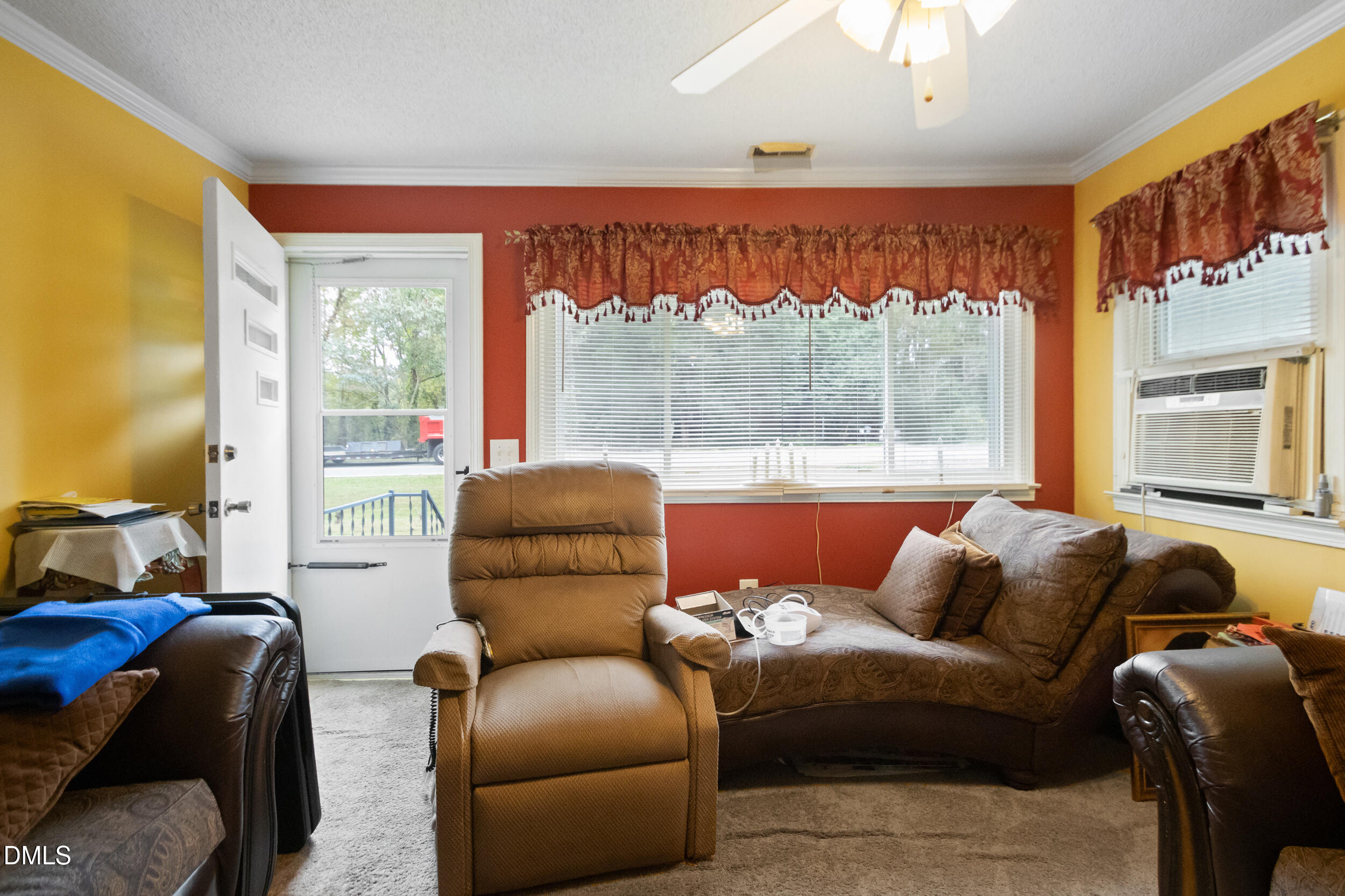 811 Jones Lester Road Roxboro, NC 27574 - Photo 3 of 27 a living room with furniture and a large window