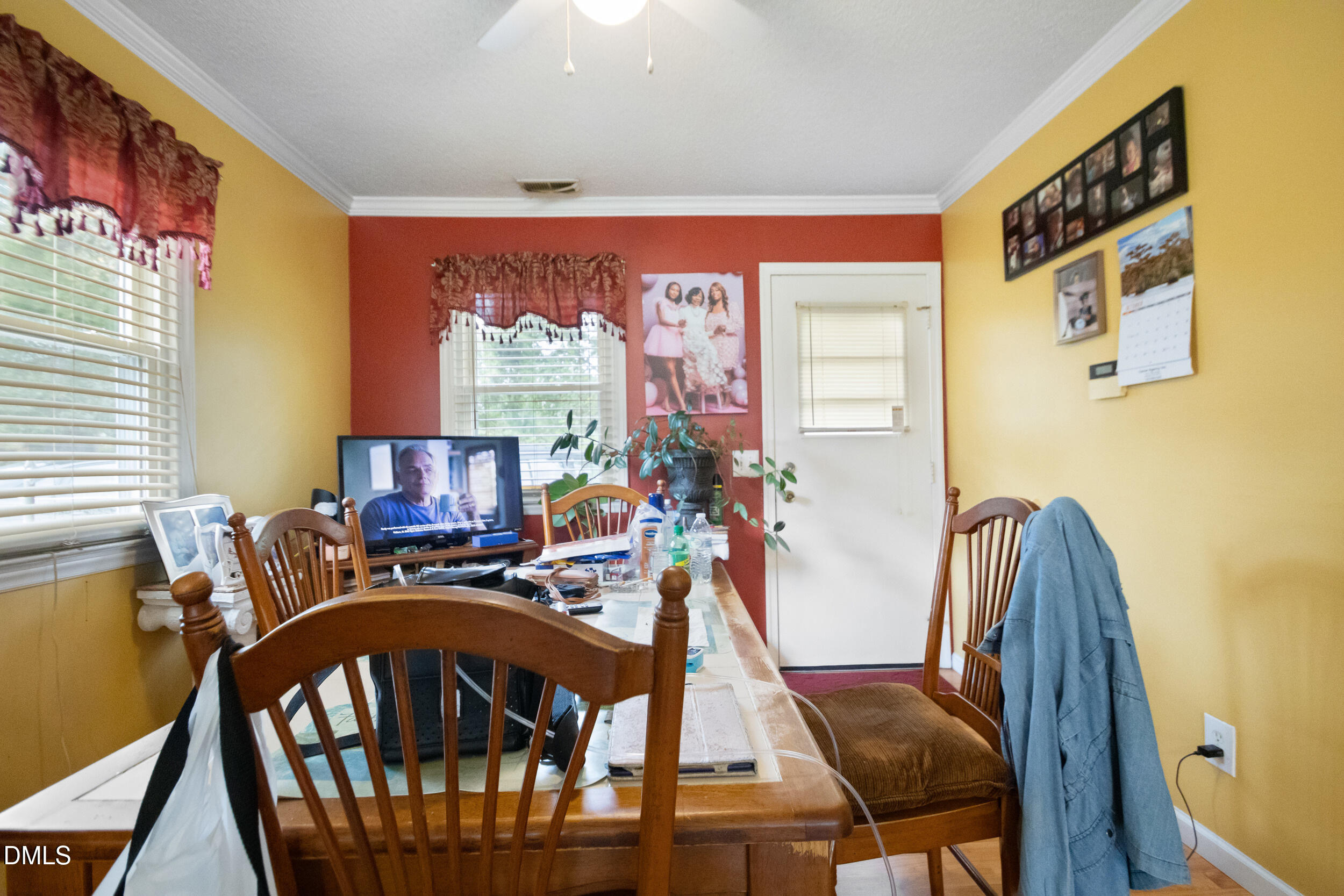 811 Jones Lester Road Roxboro, NC 27574 - Photo 6 of 27 a view of a dining room with furniture window and outside view