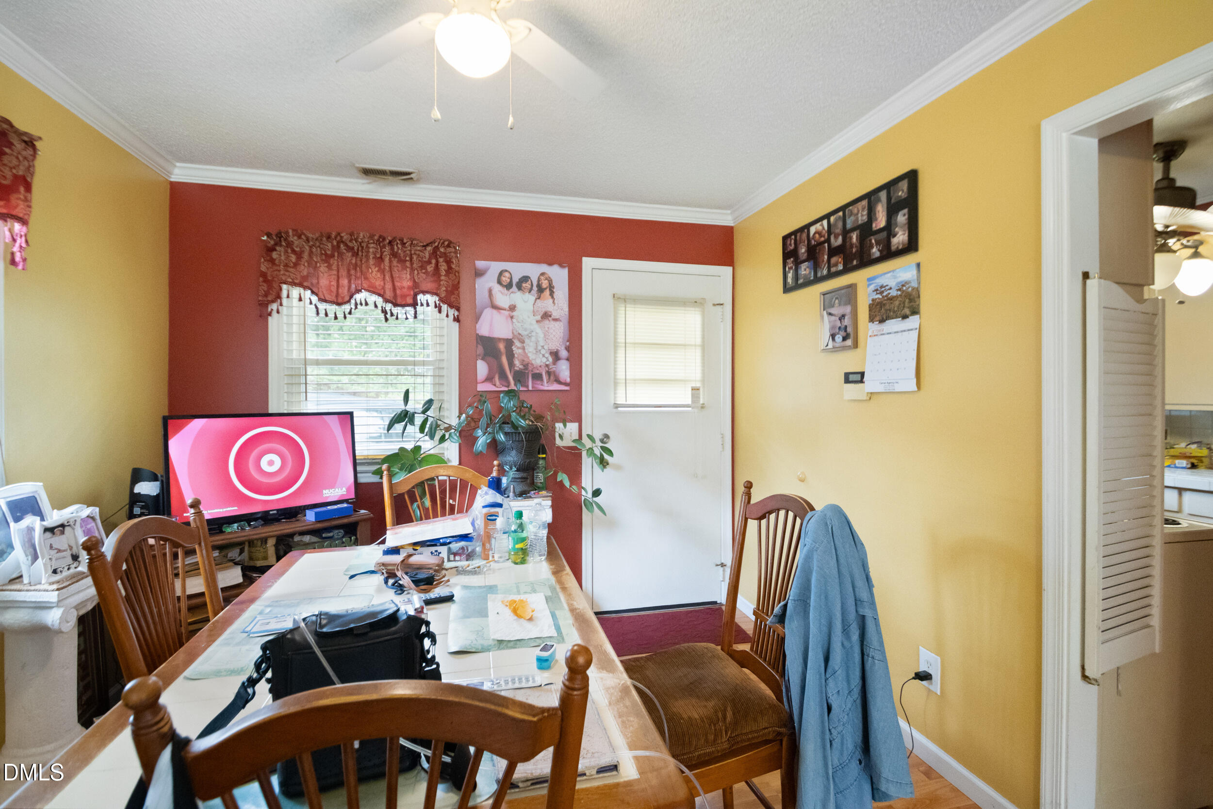811 Jones Lester Road Roxboro, NC 27574 - Photo 7 of 27 a view of a room with furniture and a flat screen tv