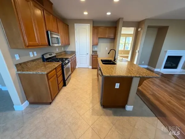 a view of storage and utility room in a kitchen