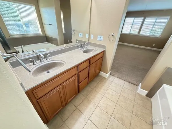 a view of a hallway with staircase