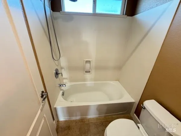 a view of a back yard of the house