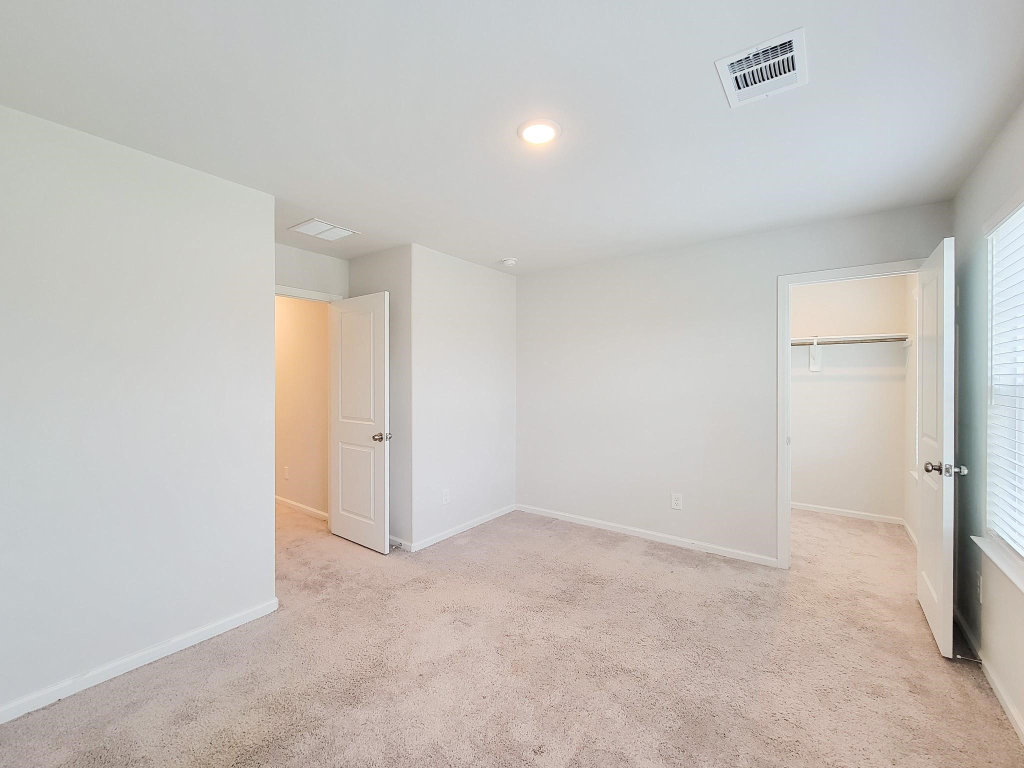94 Valiant Ridge Trail Magnolia, TX 77354 - Photo 19 of 45 an empty room with a natural light
